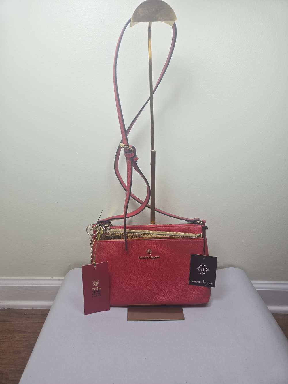 Nanette Lepore Red Pebbled Crossbody with Gold Pouch And Snake Charm